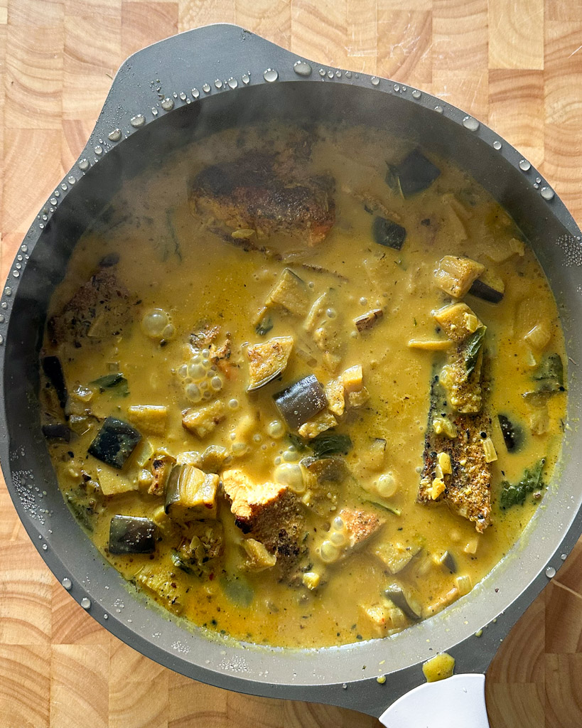 salmon coconut curry in a pot
