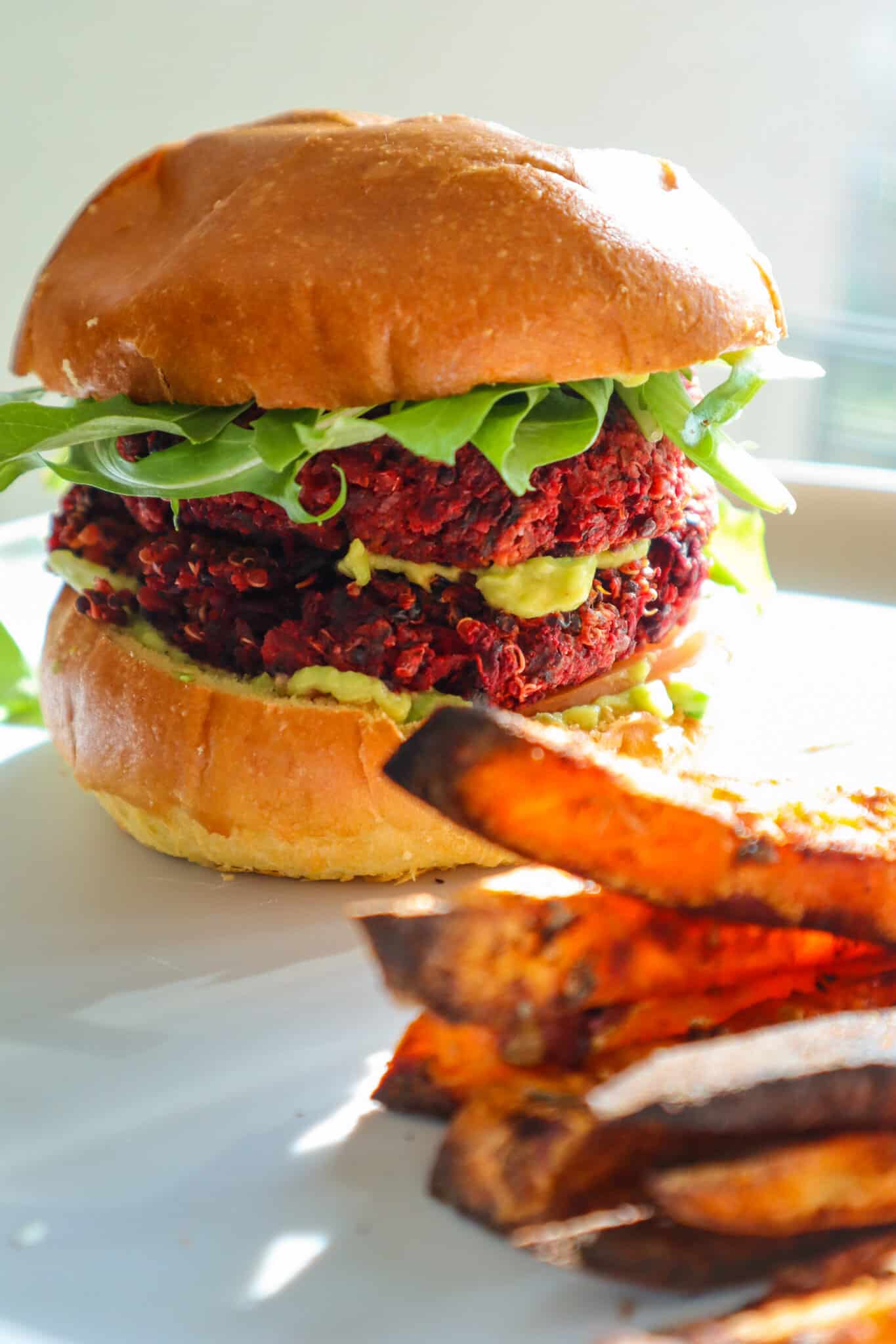 beet burger served with sweet potato fries