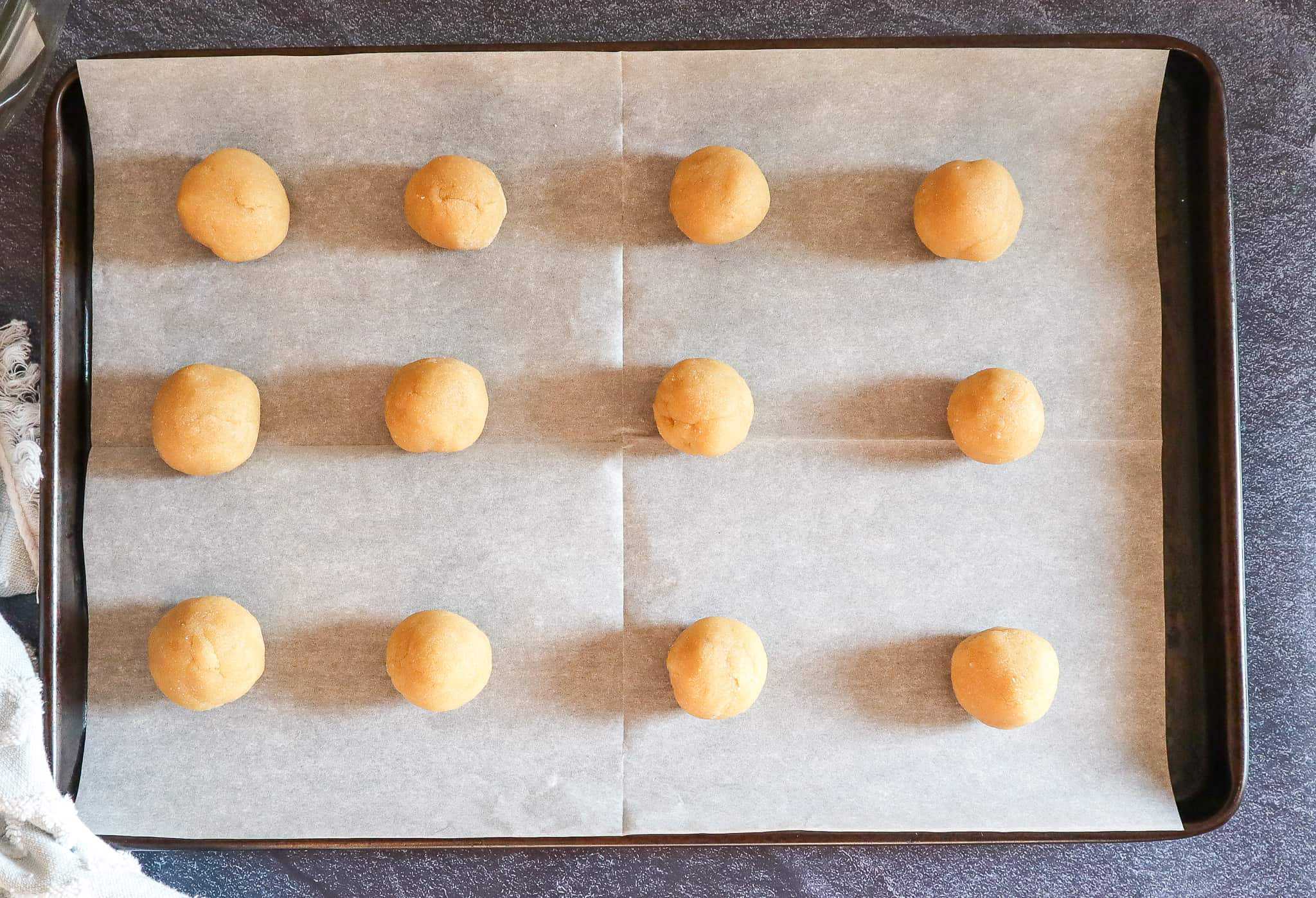 gluten free thumbprint cookies rolled into balls for baking