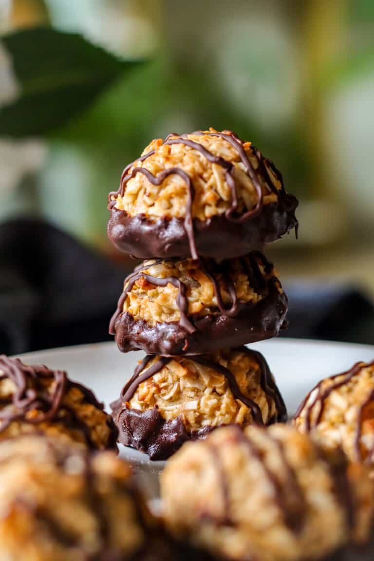 close up picture of chocolate dipped vegan coconut macaroons