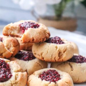 close up of almond flour thumbprint cookies
