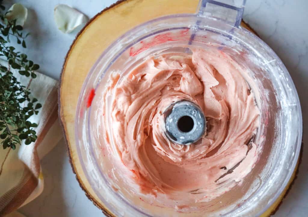overhead image of strawberry buttercream made in food processor