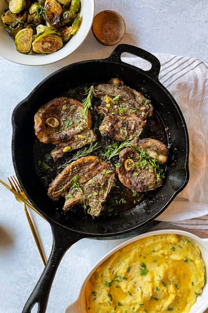 lamb shoulder chops served with brussels sprouts and parsnip mash