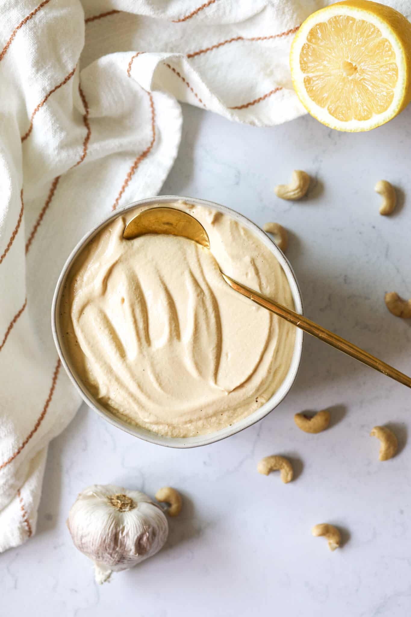 cashew cream sauce in a white bowl