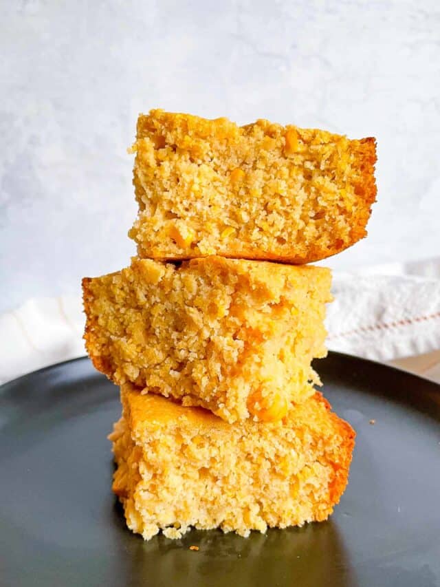 three pieces of honey cornbread stacked on one another