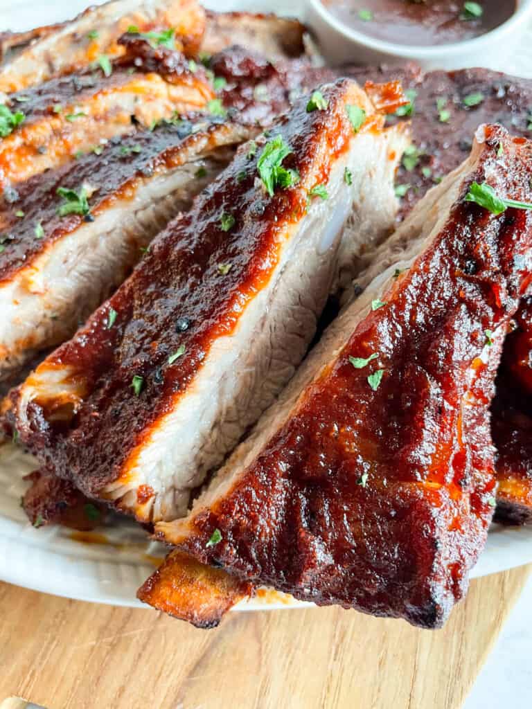 Close up view of Instant Pot Barbecue Ribs sliced.