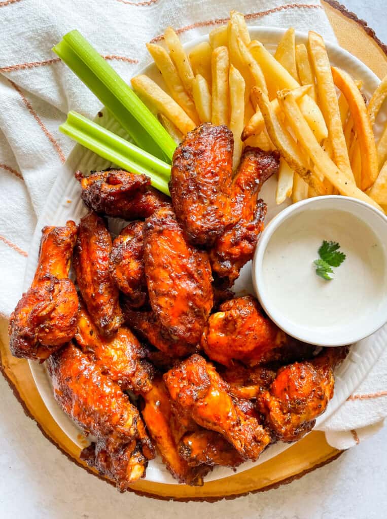 Air Fryer Buffalo Chicken Wings Served with homemade ranch, fries, and celery