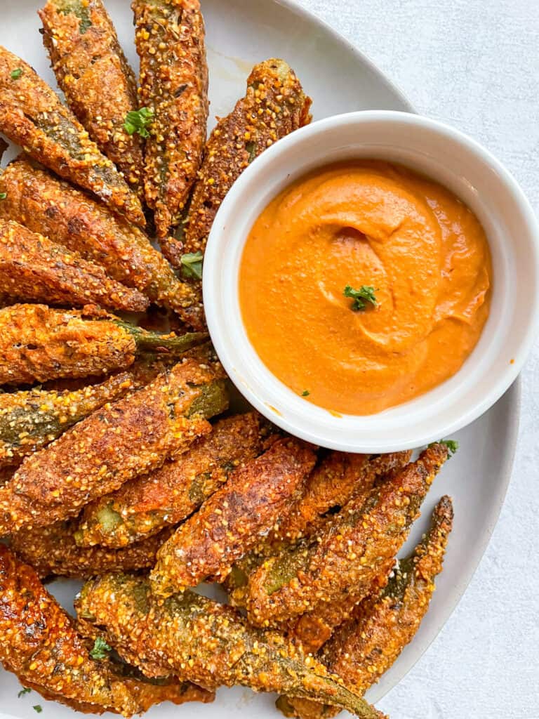 crispy air fryer okra served with creamy chipotle sauce