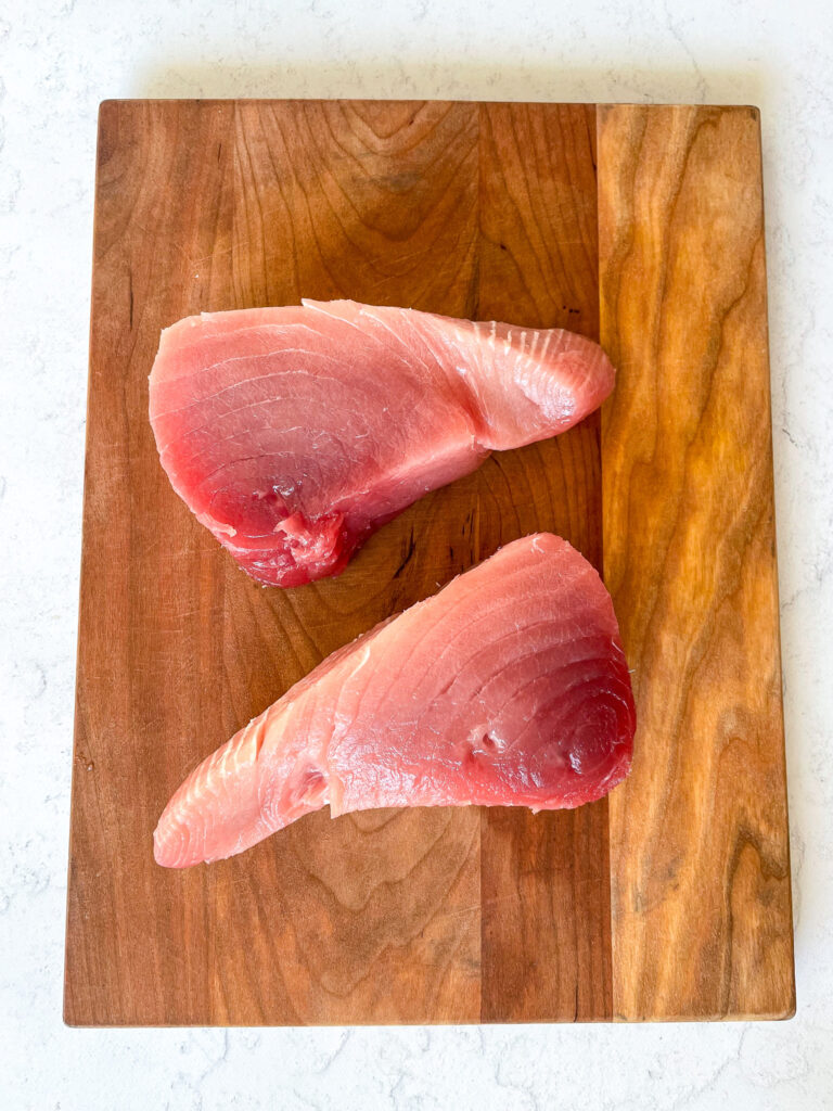 2 fresh raw pieces of ahi tuna steak