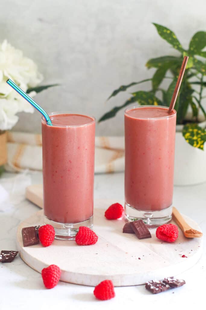 two cacao sea moss smoothie with raspberries