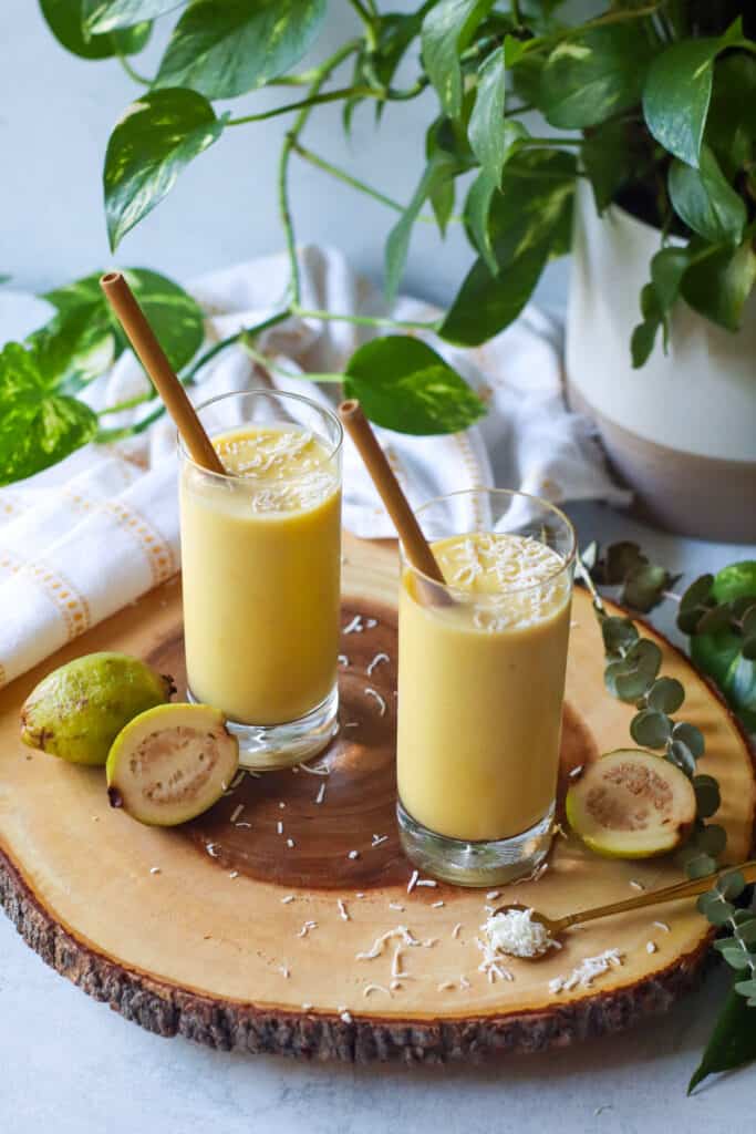 two dairy free guava smoothies with fresh guava pineapple and mango