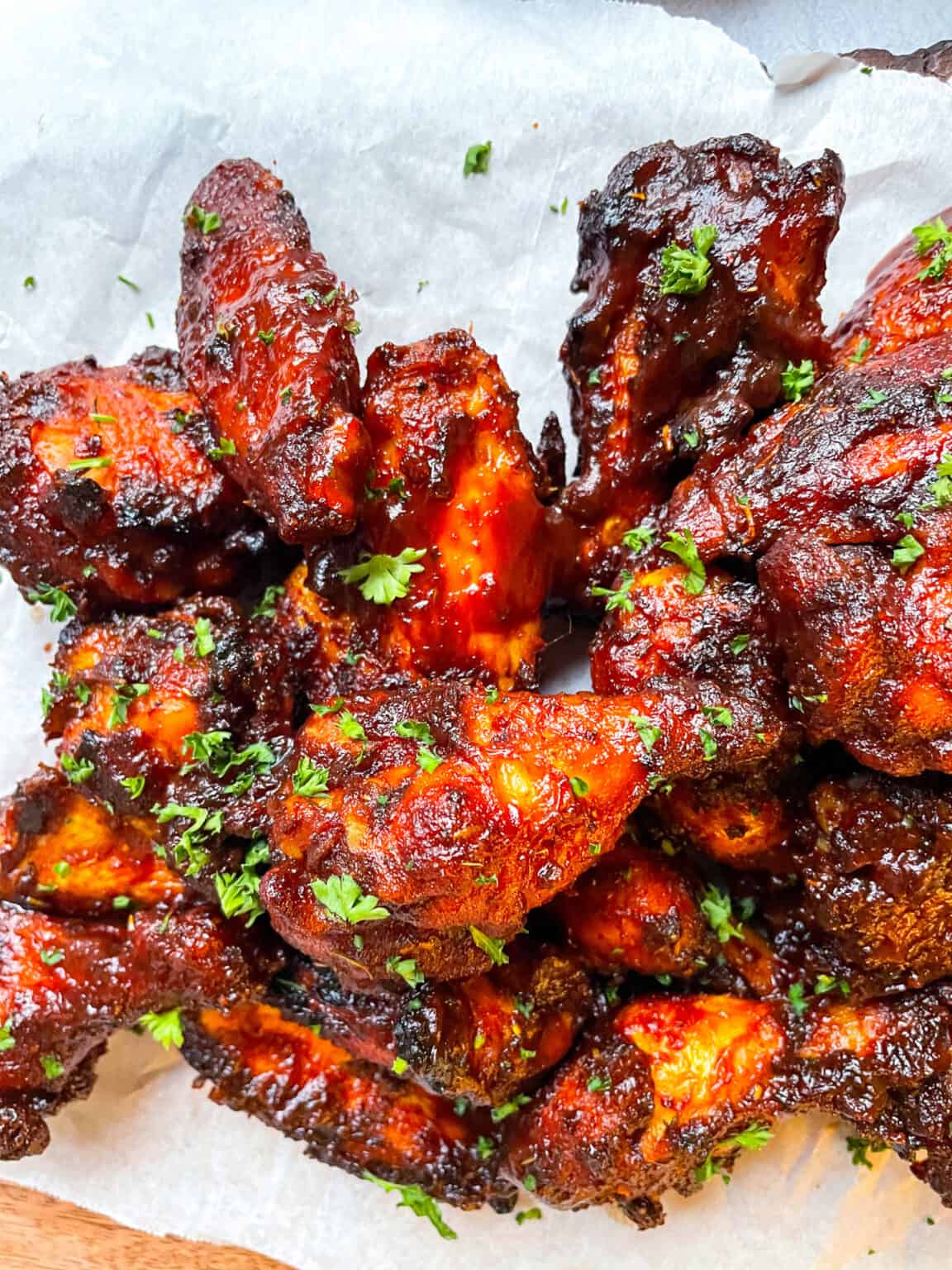 Air fryer BBQ halal chicken wings crispy caramelized skin with sticky BBQ sauce for easy weeknight dinner or party appetizer