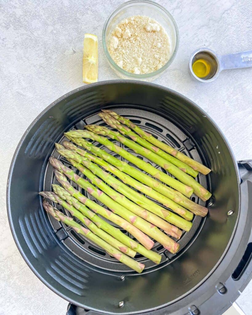 overhead view of ingredients needed for air fryer asparagus
