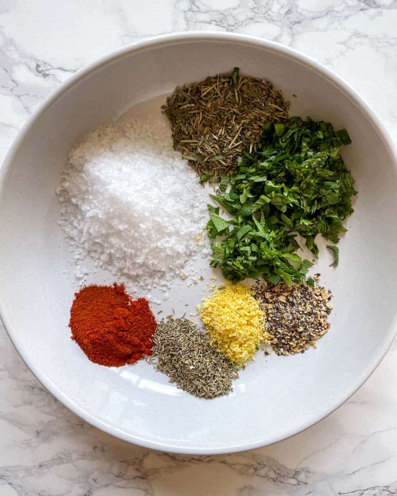 seasonings for dry brine in a large white bowl