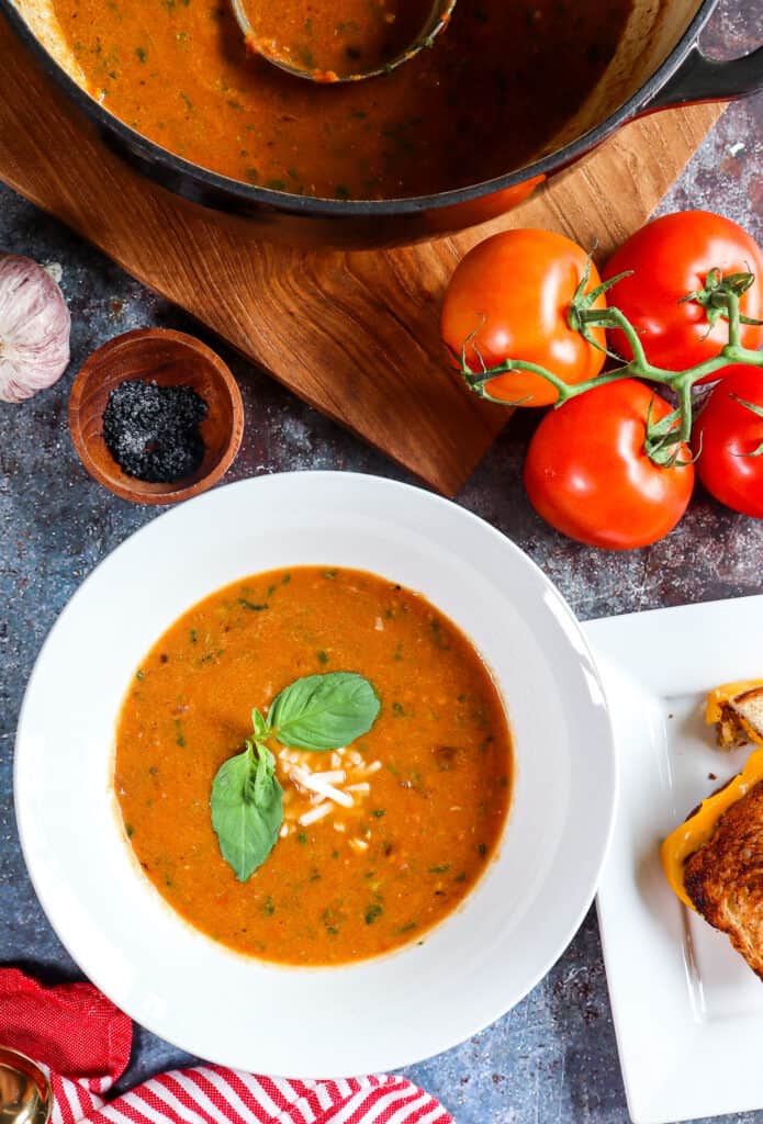 roasted tomato basil soup in a white bowl