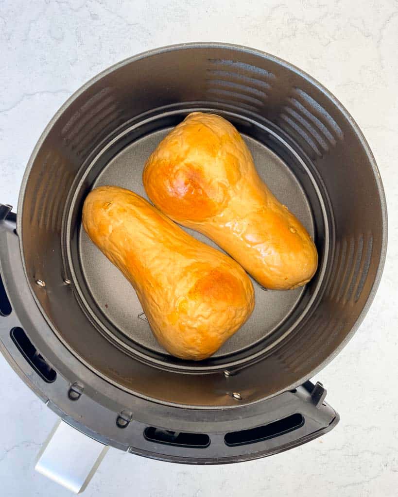 butternut squash in the air fryer skin side up after cooking halfway