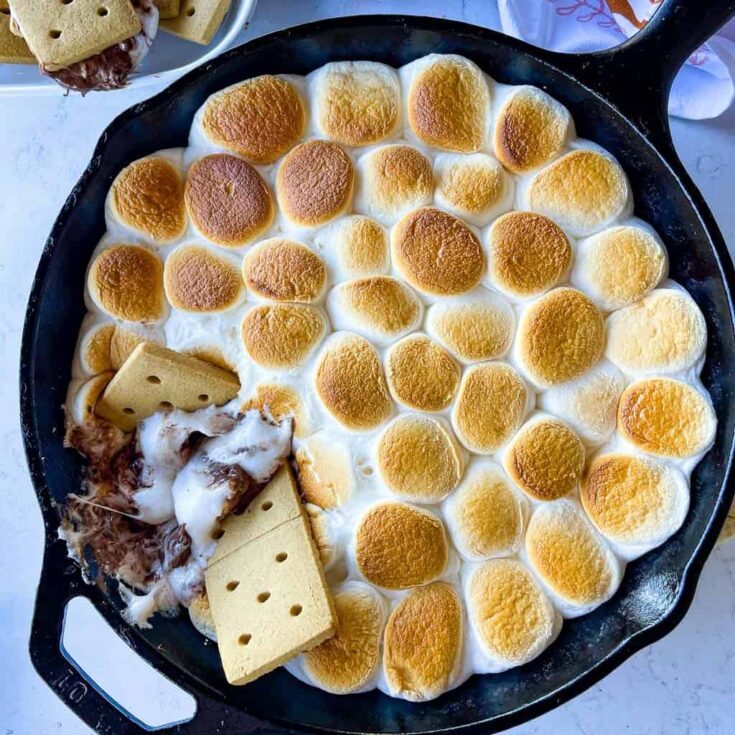 a skillet full of s'mores dip