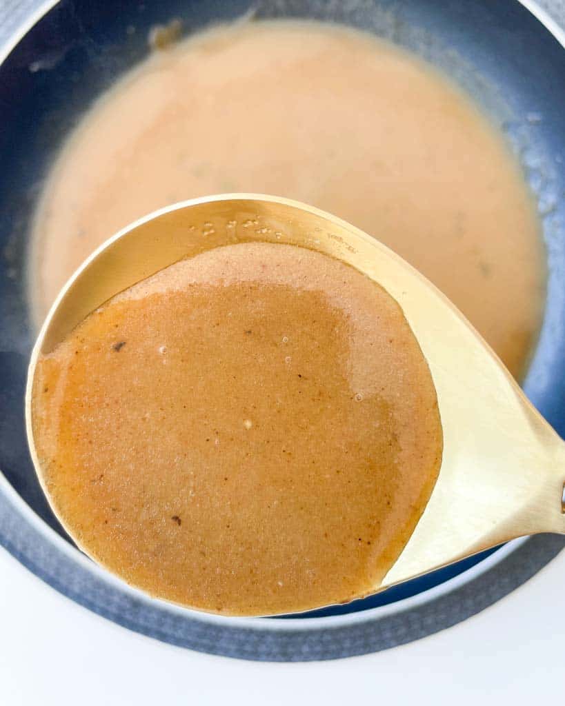 gravy in a large spoon