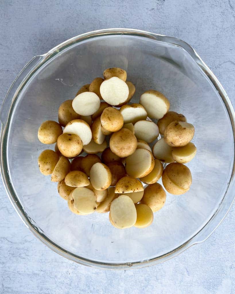 sliced baby potatoes in a clear bowl