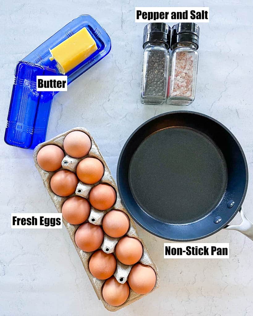 butter pepper salt fresh eggs and a non stick pan to show ingredients to make over medium eggs