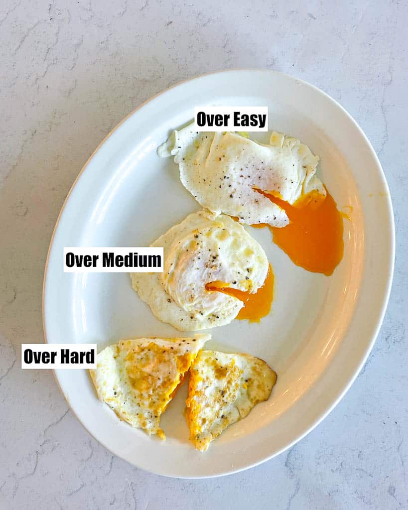 a plate of three eggs prepared three different ways