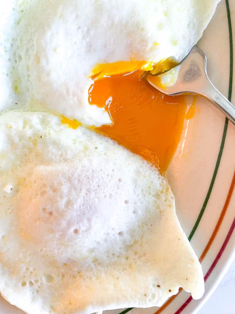 close up view of the runny yolk