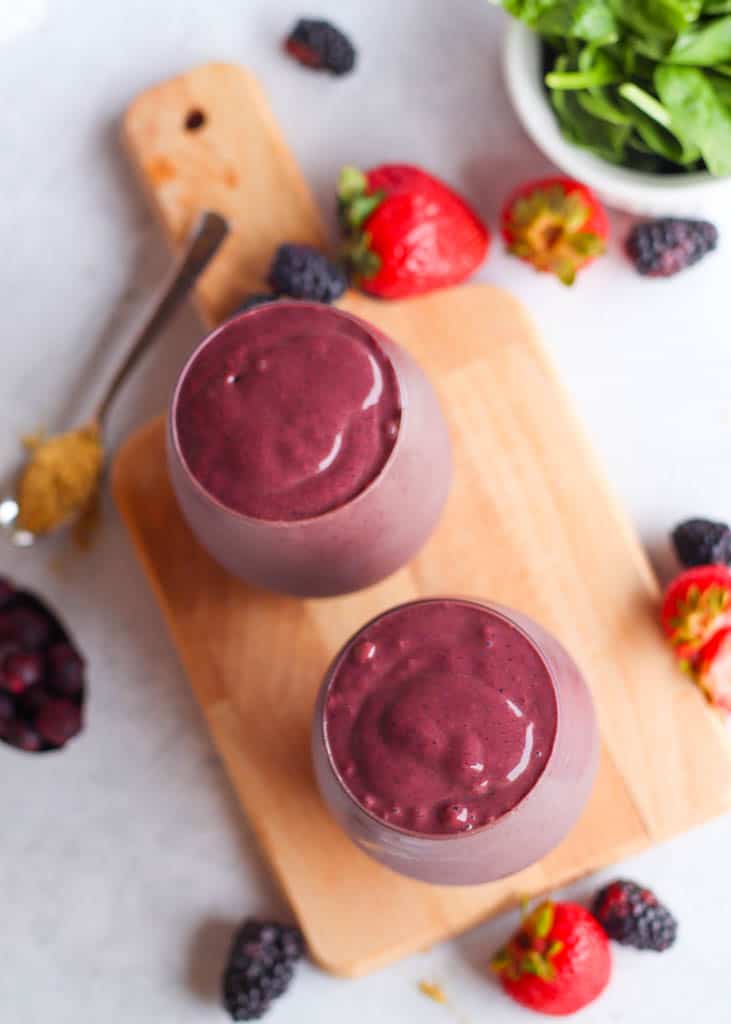 overhead view of two glasses full of antioxidant smoothies
