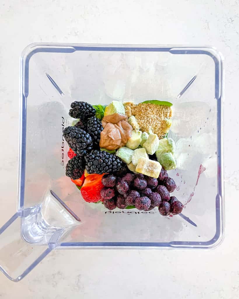 overhead view of antioxidant smoothie ingredients in a blender