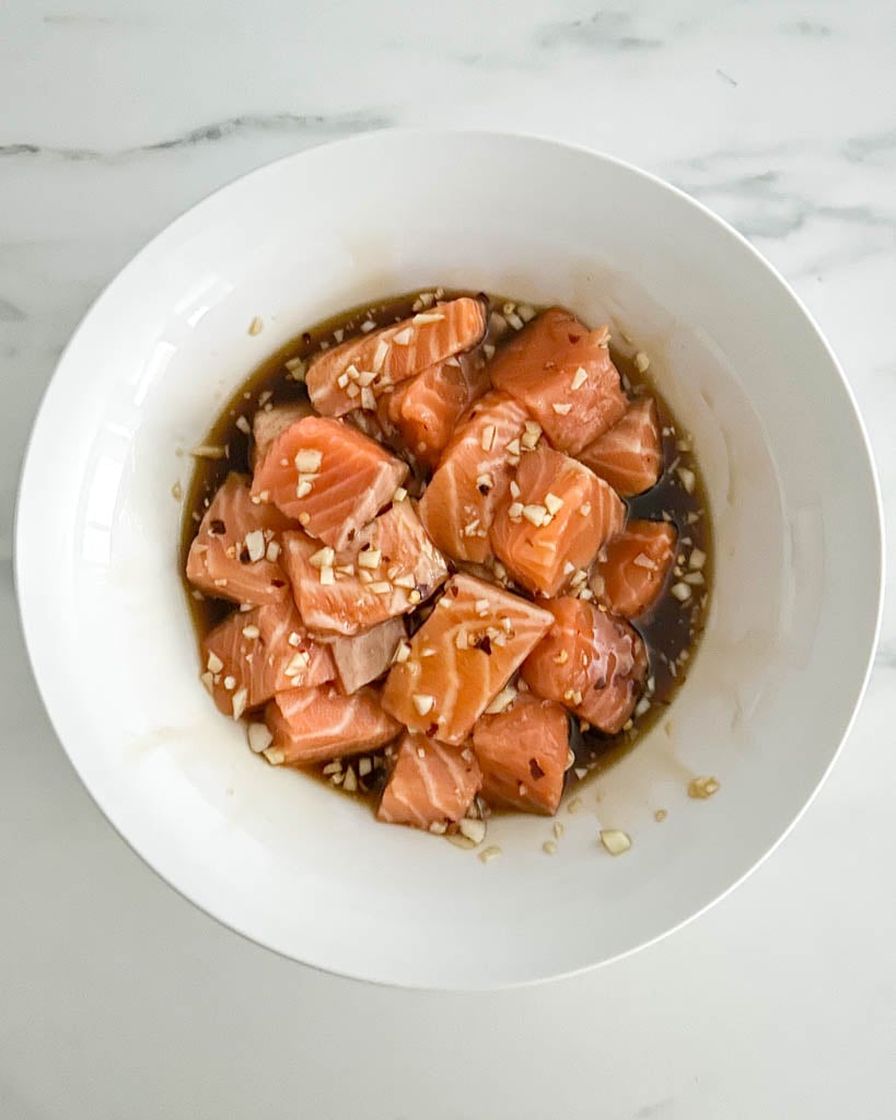 marinated chunks of salmon in a bowl