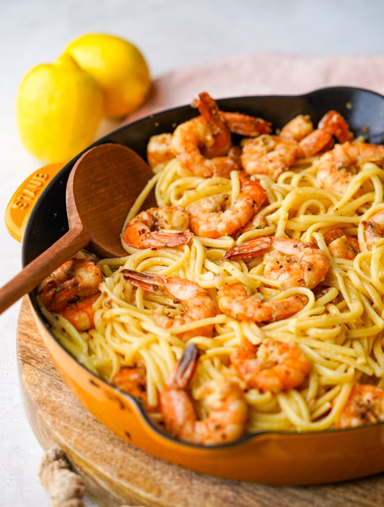 close up view of pan full of lemon garlic pasta with shrimp