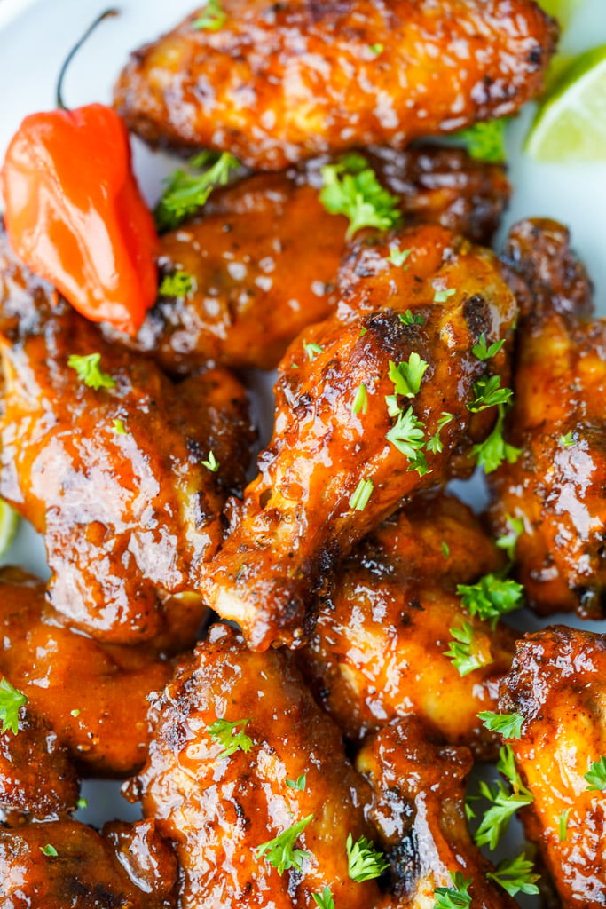 close up view of plated mango habanero wings