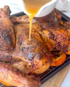 pouring maple glaze onto turkey