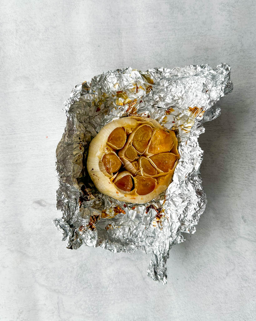 roasted head of garlic wrapped in aluminum foil