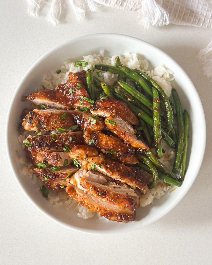 Ginger Chicken in a bowl with green beans and rice