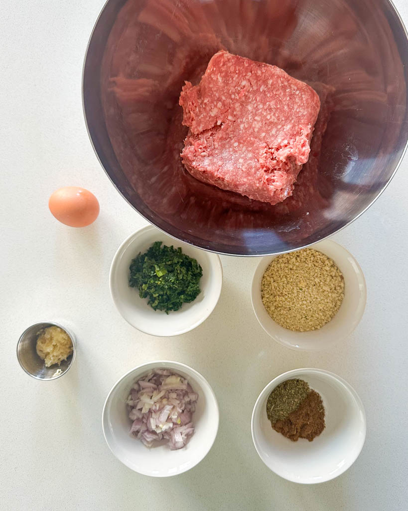 ingredients to make lamb meatballs from scratch shown 