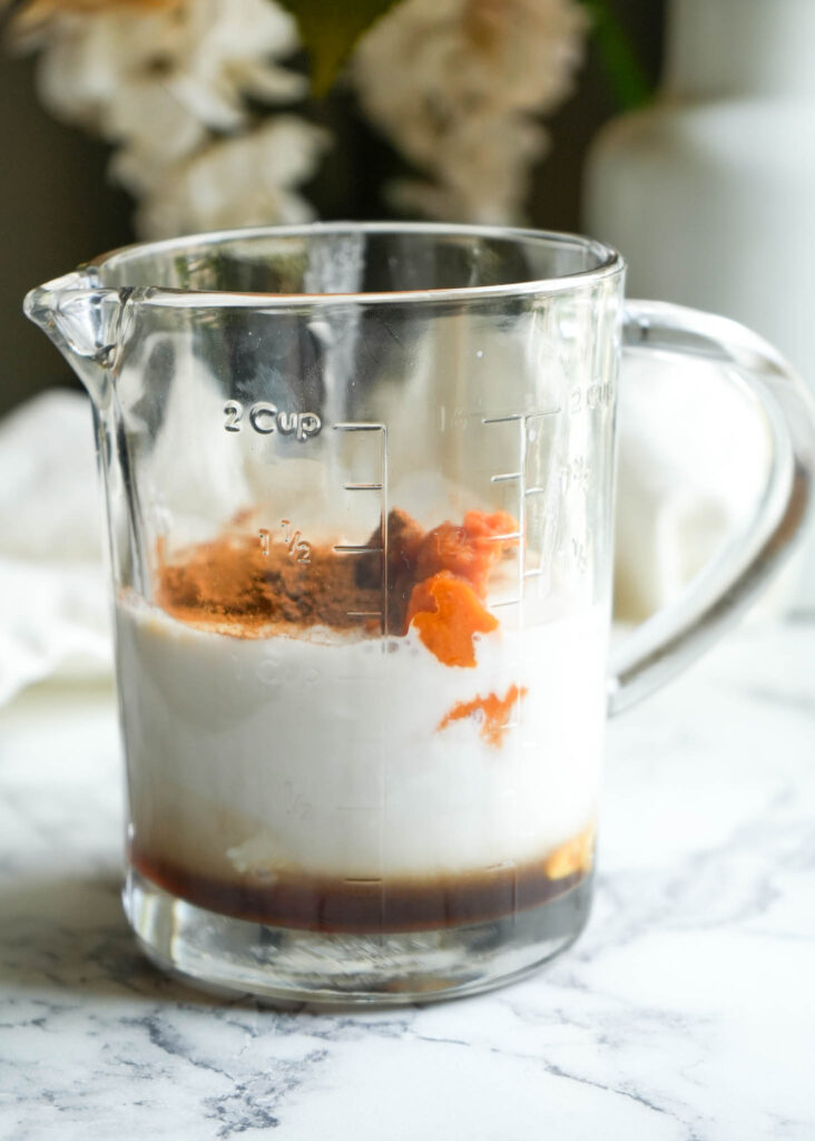 ingredients to make cold foam in a measuring cup