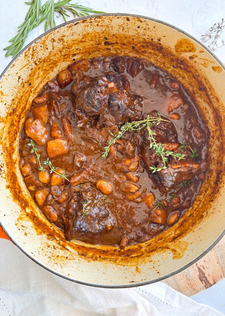 a pot of cooked oxtail stew