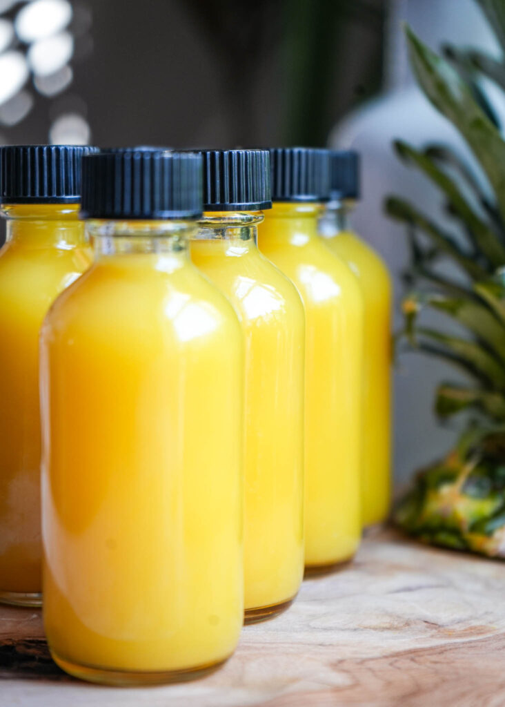 wellness shots made with ginger turmeric pineapple coconut water lemongrass