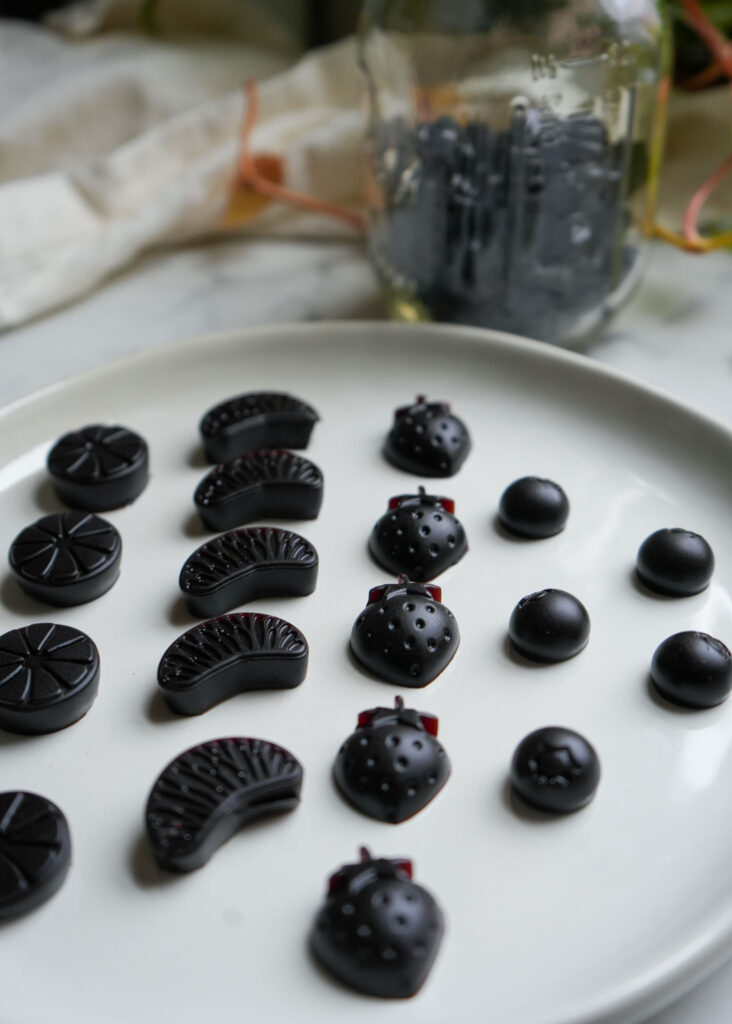 homemade elderberry gummies on a plate