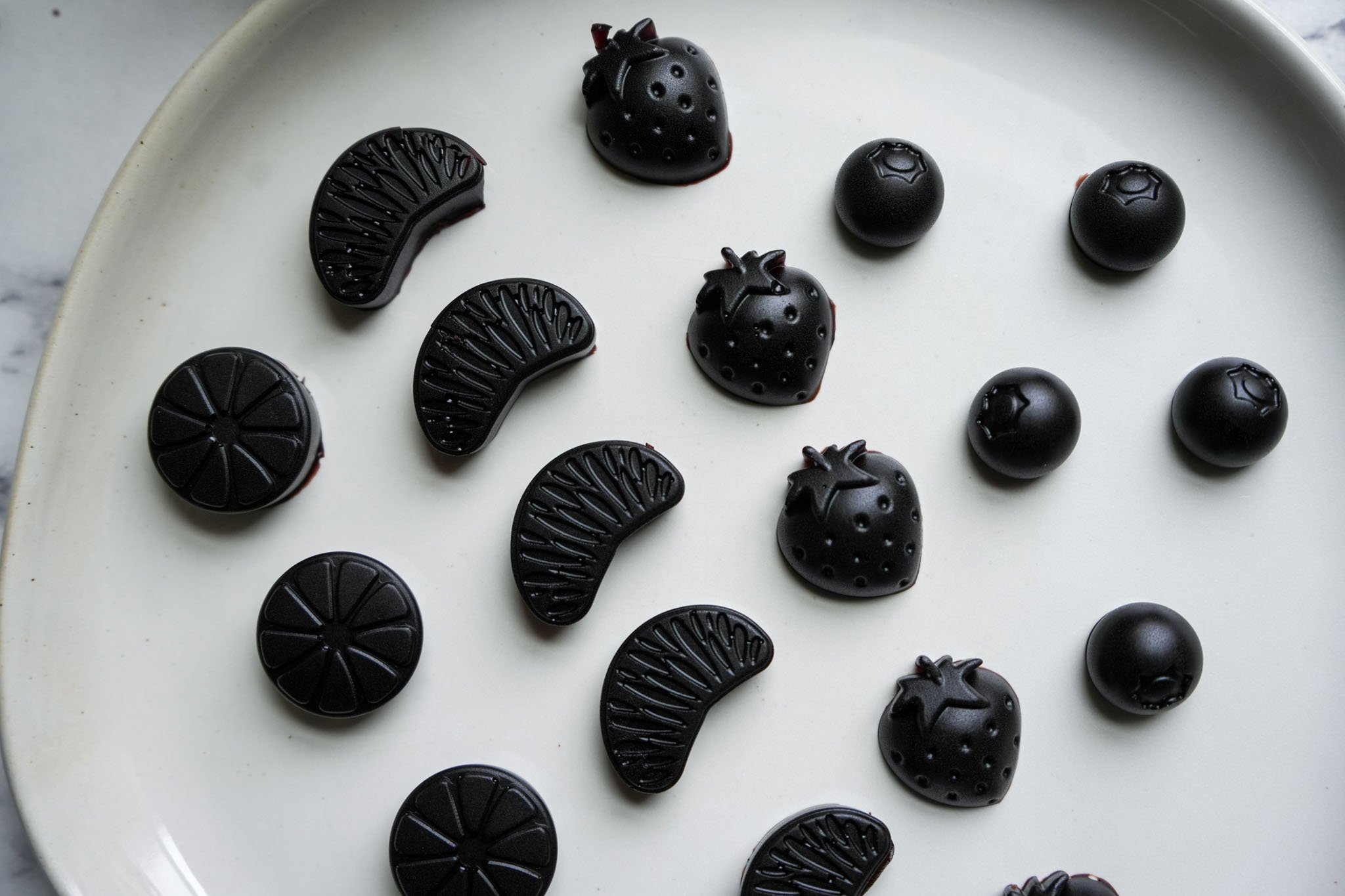 homemade elderberry gummies on a plate