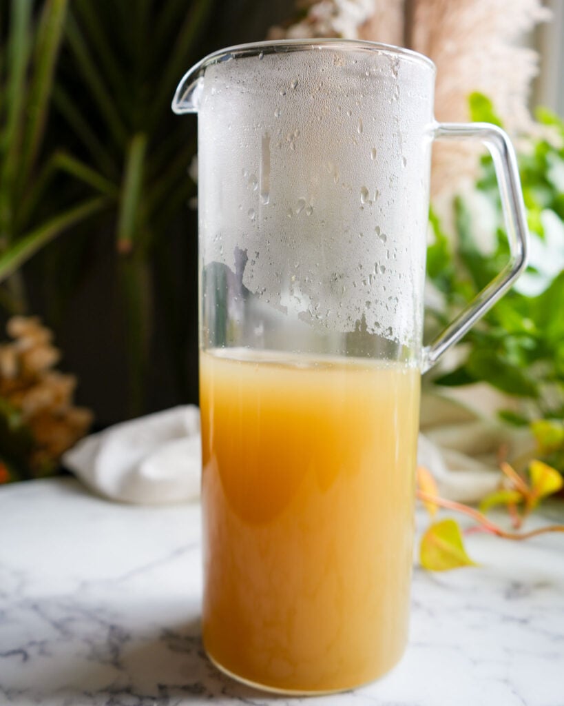 a pitcher of ginger mixture