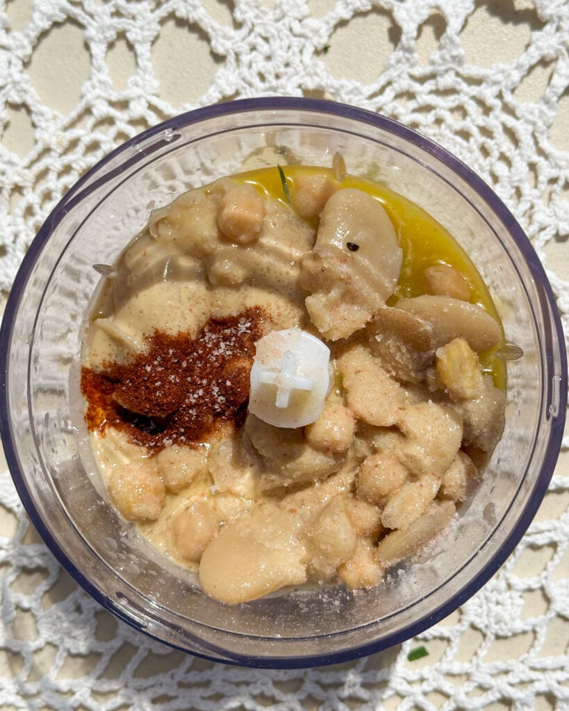 ingredients for white bean hummus in a food processor