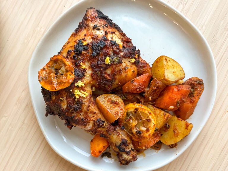 chicken and potatoes on a plate