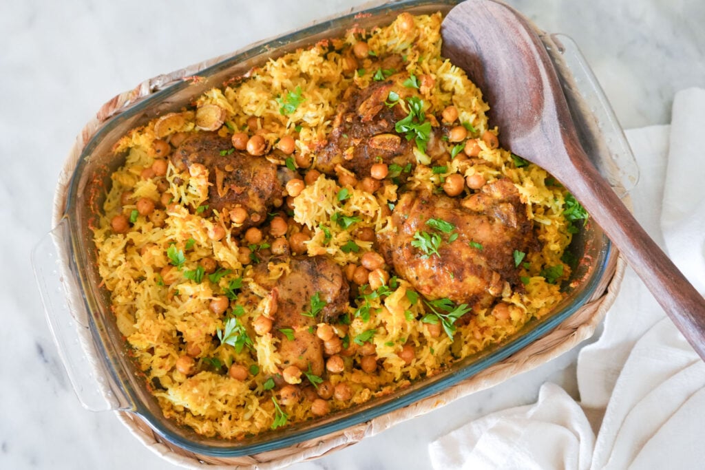 oven baked chicken and rice in a baking dish