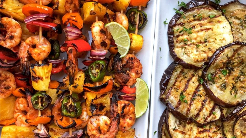 grilled eggplants served with shrimp kebobs